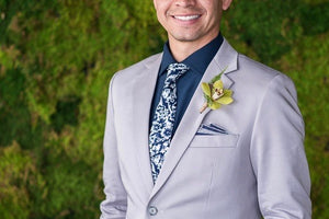 Groom from the Big Fake Wedding Denver wearing a custom tie by Tiebreaker Bow Ties